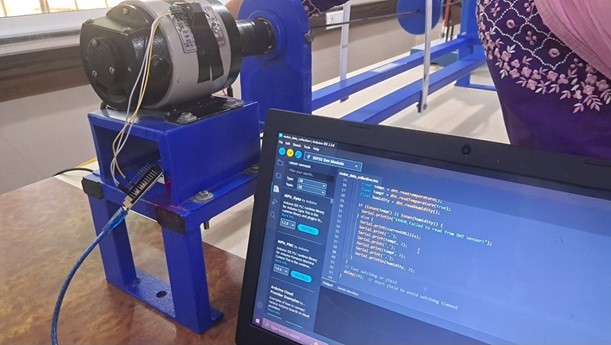 Physical hardware setup with industrial motor, ESP32 and sensors